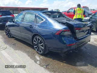 2023 Honda Accord Touring with VIN 1HGCY2F81PA048434, listed as a IAAI auction lot 42306343 with 14,878 mi miles and . Bid and sale history available at DreamBid. Image 3.