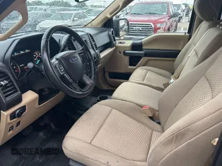 2018 Ford F-150 XL with VIN 1FTEW1E51JKF17733, listed as a IAAI auction lot 42202523 with 165,077 mi miles. Bid and sale history available at carsss.com. Image 5.