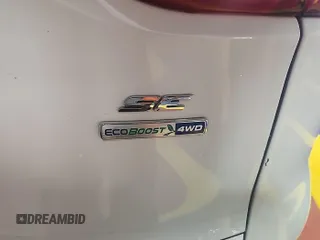 2014 Ford Escape SE z VIN 1FMCU9GX7EUC02600, wystawiony jako IAAI lot #42570755 z przebiegiem 86 871 mil mil oraz . Historia ofert i sprzedaży dostępna na DreamBid. Obrazek 22.