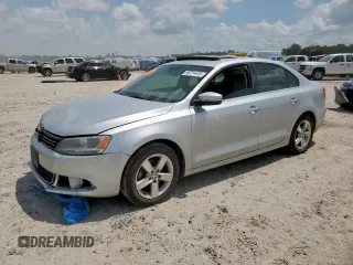 2014 Volkswagen Jetta TDI w/Premium with VIN 3VW3L7AJ2EM404665, listed as a Copart auction lot 59731415 with 233,581 mi miles and Salvage title. Bid and sale history available at DreamBid. Image 1.