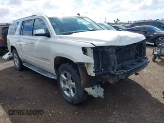 2015 Chevrolet Suburban LTZ with VIN 1GNSKKKC5FR127201, listed as a IAAI auction lot 41706562 with 151,644 mi miles and . Bid and sale history available at DreamBid. Image 1.