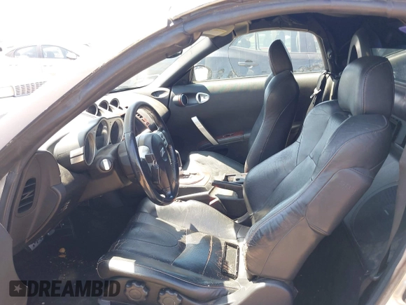 2005 Nissan 350Z Touring with VIN JN1AZ36A85M752320, listed as a IAAI auction lot 42001942 with 174,564 mi miles. Bid and sale history available at carsss.com. Image 5.