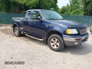 2003 Ford F-150 z VIN 2FTRX08WX3CA03142, wystawiony jako IAAI lot #42425278 z przebiegiem 165 950 mil mil oraz . Historia ofert i sprzedaży dostępna na DreamBid. Obrazek 1.