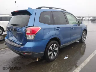 2018 Subaru Forester Premium with VIN JF2SJAEC9JH576012, listed as a IAAI auction lot 41512545 with 94,121 mi miles. Bid and sale history available at carsss.com. Image 4.