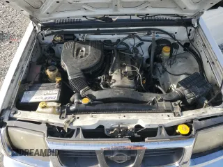 1999 Nissan Frontier XE with VIN 1N6DD26S4XC319806, listed as a Copart auction lot 54233635 with 311,759 mi miles and Clean title. Bid and sale history available at DreamBid. Image 11.