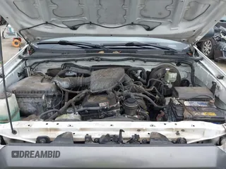 2015 Toyota Tacoma z VIN 5TFTX4CN6FX047623, wystawiony jako IAAI lot #42458260 z przebiegiem 224 496 mil mil oraz . Historia ofert i sprzedaży dostępna na DreamBid. Obrazek 10.