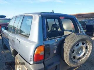 1997 Toyota RAV4 with VIN JT3GP10VXV0015872, listed as a IAAI auction lot 41827830 with 314,640 mi miles and . Bid and sale history available at DreamBid. Image 6.