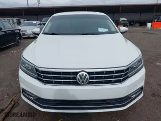 2018 Volkswagen Passat 2.0T SE with VIN 1VWBA7A35JC018885, listed as a IAAI auction lot 41955324 with 107,046 mi miles. Bid and sale history available at carsss.com. Image 6.