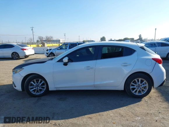 2014 Mazda 3 i Grand Touring with VIN JM1BM1M7XE1102093, listed as a IAAI auction lot 41344433 with 148,395 mi miles and . Bid and sale history available at DreamBid. Image 14.