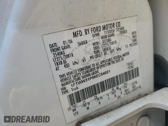 2006 Ford F-350 XL z VIN 1FTWW31P56EC54921, wystawiony jako Copart lot #60072945 z przebiegiem 297 681 mil mil oraz Szkoda całkowita • Salvage title. Historia ofert i sprzedaży dostępna na DreamBid. Obrazek 12.