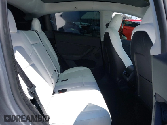 2024 Tesla Model Y Performance with VIN 7SAYGDEF9RA299036, listed as a IAAI auction lot 42140788 with 14,844 mi miles and . Bid and sale history available at DreamBid. Image 8.