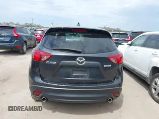 2014 Mazda CX-5 Grand Touring with VIN JM3KE2DY0E0354220, listed as a IAAI auction lot 41885502 with 168,901 mi miles. Bid and sale history available at carsss.com. Image 16.