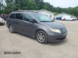 2012 Honda Odyssey EX-L with VIN 5FNRL5H63CB077598, listed as a IAAI auction lot 42648836 with 219,629 mi miles and . Bid and sale history available at DreamBid. Image 1.