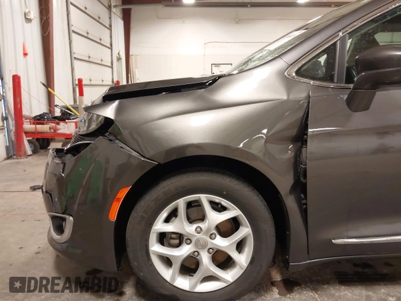 2017 Chrysler Pacifica Touring L with VIN 2C4RC1BG5HR803306, listed as a IAAI auction lot 41968455 with 84,714 mi miles and . Bid and sale history available at DreamBid. Image 19.