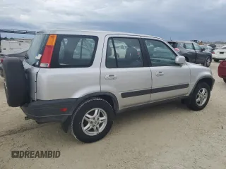 1999 Honda CR-V EX with VIN JHLRD1865XC064542, listed as a Copart auction lot 74730634 with 71,298 mi miles and Salvage Title. Bid and sale history available at carsss.com. Image 3.