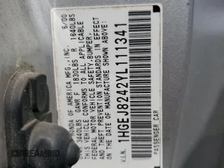 2000 Honda Civic EX z VIN 1HGEJ8242YL111341, wystawiony jako Copart lot #56953105 z przebiegiem 251 633 mil mil oraz Szkoda całkowita • Salvage title. Historia ofert i sprzedaży dostępna na DreamBid. Obrazek 12.