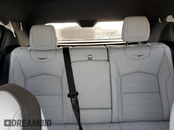 2024 Cadillac XT4 AWD Sport с VIN 1GYFZFR47RF125557, выставлен на аукционе Copart как лот 70869104 с пробегом 8 714 миль миль и Списание • Salvage title. История ставок и продаж доступна на DreamBid. Изображение 10.