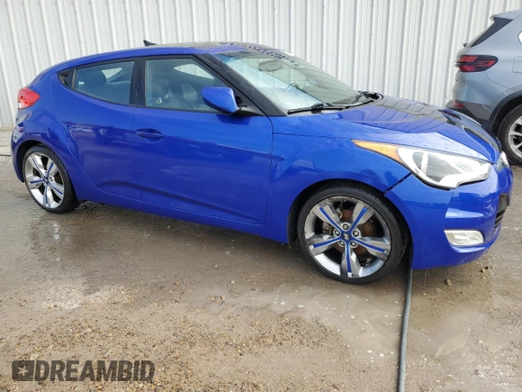 2012 Hyundai Veloster w/Red Int z VIN KMHTC6AD2CU048049, wystawiony jako Copart lot #85809854 z przebiegiem 122 914 mil mil oraz Szkoda całkowita • Salvage title. Historia ofert i sprzedaży dostępna na DreamBid. Obrazek 4.