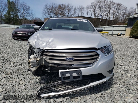 2018 Ford Taurus SEL with VIN 1FAHP2E87JG137928, listed as a Copart auction lot 53438695 with 56,874 mi miles and Salvage title. Bid and sale history available at DreamBid. Image 5.