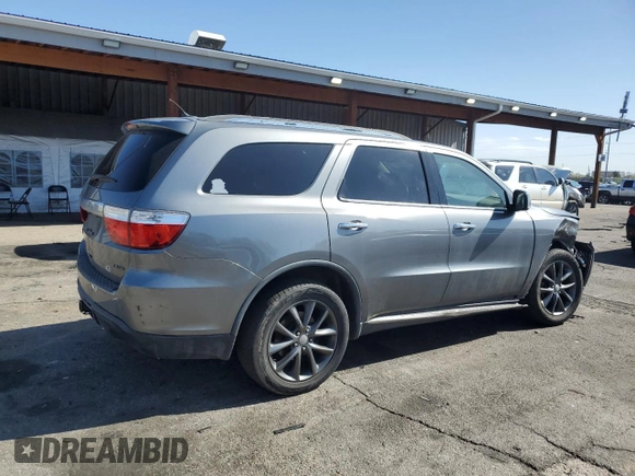 2013 Dodge Durango Crew with VIN 1C4RDJDG7DC554102, listed as a Copart auction lot 54045335 with 228,176 mi miles and Salvage Title. Bid and sale history available at DreamBid. Image 3.