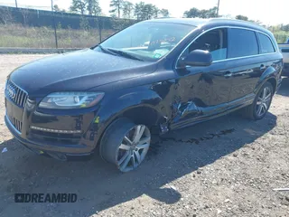 2014 Audi Q7 Premium Plus with VIN WA1LGAFE5ED014701, listed as a IAAI auction lot 42107552 with 98,919 mi miles and . Bid and sale history available at DreamBid. Image 18.