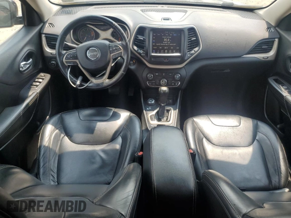 2016 Jeep Cherokee Limited with VIN 1C4PJMDB6GW225688, listed as a Copart auction lot 59818925 with 144,948 mi miles and Salvage title. Bid and sale history available at DreamBid. Image 8.