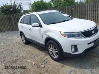 2014 Kia Sorento LX z VIN 5XYKTCA63EG524801, wystawiony jako IAAI lot #42471876 z przebiegiem 143 319 mil mil oraz . Historia ofert i sprzedaży dostępna na DreamBid. Obrazek 1.