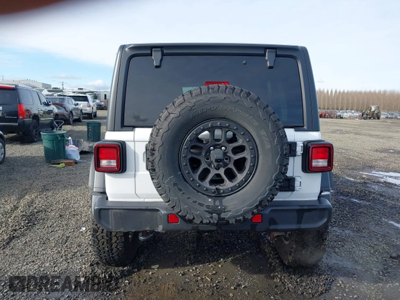 2023 Jeep Wrangler Sport with VIN 1C4HJXDG4PW567027, listed as a IAAI auction lot 41633197 with 14,782 mi miles and . Bid and sale history available at DreamBid. Image 17.