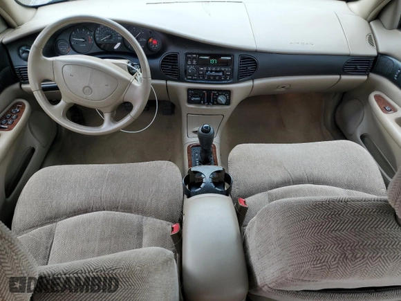 2003 Buick Regal LS z VIN 2G4WB52K731166956, wystawiony jako Copart lot #54233005 z przebiegiem 192 207 mil mil oraz Nie do naprawy • Non repairable. Historia ofert i sprzedaży dostępna na DreamBid. Obrazek 8.