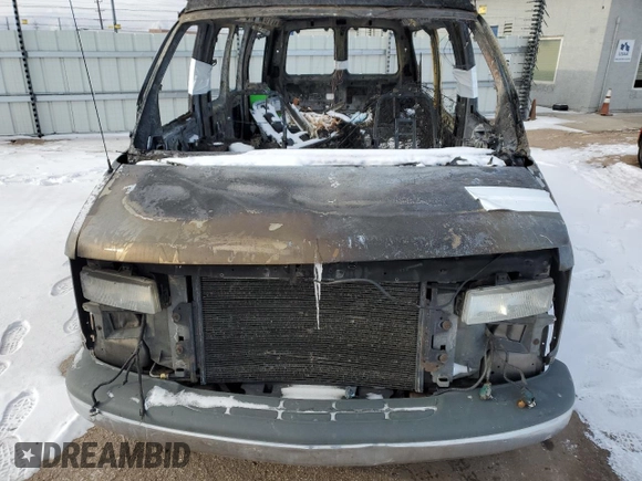 2002 Chevrolet Express z VIN 1GBFG15R821223150, wystawiony jako Copart lot #88856955 z przebiegiem Nie podano mil oraz Nie do naprawy. Historia ofert i sprzedaży dostępna na DreamBid. Obrazek 12.