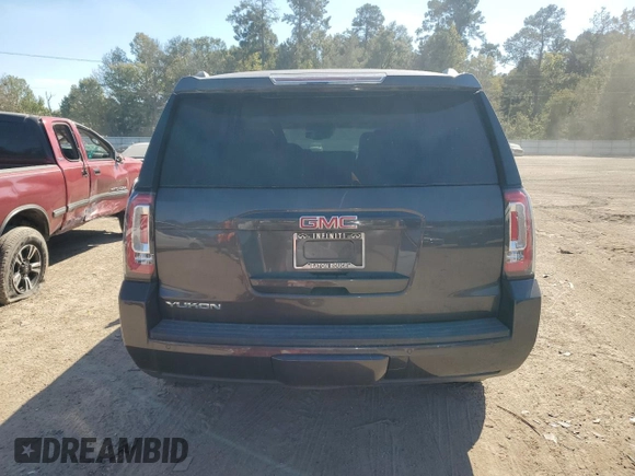 2015 GMC Yukon SLT with VIN 1GKS1BKC0FR239629, listed as a Copart auction lot 77414814 with 171,611 mi miles and Salvage Title. Bid and sale history available at carsss.com. Image 6.