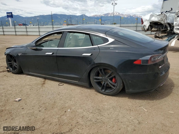 2015 Tesla Model S 85D with VIN 5YJSA1H45FF083471, listed as a Copart auction lot 56947734 with 101648 miles and Salvage Title. Bid and sale history available at carsss.com. Image 2.