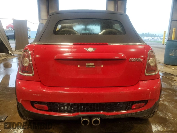 2010 MINI Convertible S with VIN WMWMS3C50ATY51636, listed as a Copart auction lot 66097715 with 103,525 mi miles and Salvage title. Bid and sale history available at DreamBid. Image 6.