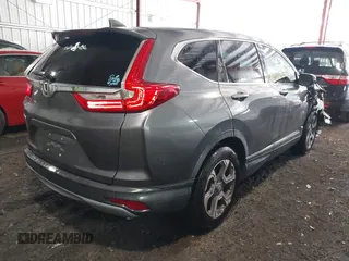 2018 Honda CR-V EX-L with VIN 7FARW1H82JE057118, listed as a IAAI auction lot 41984970 with 103,489 mi miles and . Bid and sale history available at carsss.com. Image 4.