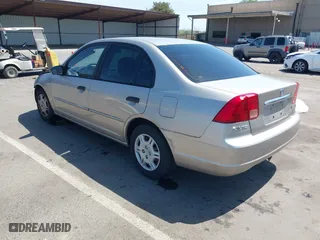2001 Honda Civic LX with VIN 1HGES16591L002954, listed as a IAAI auction lot 42057695 with 238,849 mi miles. Bid and sale history available at carsss.com. Image 3.
