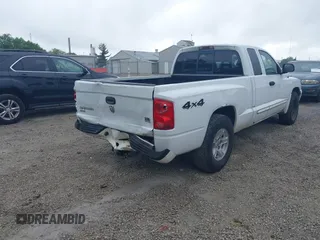 2005 Dodge Dakota SLT with VIN 1D7HW42N75S213191, listed as a IAAI auction lot 42345554 with 152,833 mi miles and . Bid and sale history available at DreamBid. Image 4.