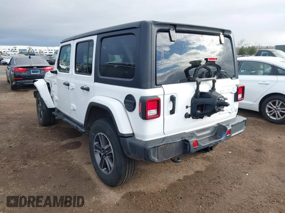 2023 Jeep Wrangler Sahara with VIN 1C4HJXEN7PW701607, listed as a IAAI auction lot 41774580 with 13,376 mi miles. Bid and sale history available at carsss.com. Image 3.