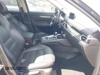 2017 Mazda CX-5 Grand Touring with VIN JM3KFADL3H0227655, listed as a IAAI auction lot 41897981 with 103,545 mi miles. Bid and sale history available at carsss.com. Image 5.