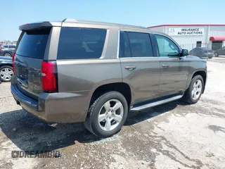 2016 Chevrolet Tahoe LT z VIN 1GNSCBKC8GR210829, wystawiony jako IAAI lot #42459936 z przebiegiem 160 518 mil mil oraz . Historia ofert i sprzedaży dostępna na DreamBid. Obrazek 4.