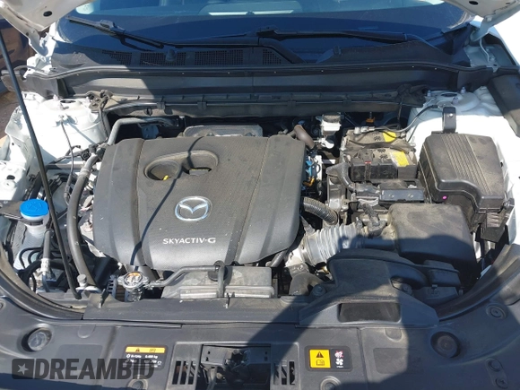 2021 Mazda CX-5 Grand Touring with VIN JM3KFBDM3M0493752, listed as a IAAI auction lot 42456854 with 35,122 mi miles and . Bid and sale history available at DreamBid. Image 10.