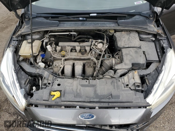 2016 Ford Focus Titanium z VIN 1FADP3N27GL329026, wystawiony jako Copart lot #60910475 z przebiegiem 98 794 mil mil oraz Szkoda całkowita • Salvage title. Historia ofert i sprzedaży dostępna na DreamBid. Obrazek 11.