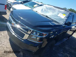 2015 Chevrolet Tahoe Commercial with VIN 1GNLC2EC3FR280365, listed as a IAAI auction lot 40580594 with 195,740 mi miles and . Bid and sale history available at DreamBid. Image 2.
