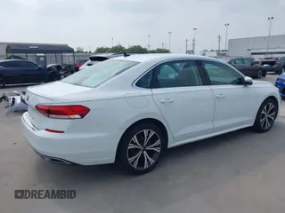 2021 Volkswagen Passat SE z VIN 1VWSA7A32MC014376, wystawiony jako IAAI lot #42314372 z przebiegiem 81 209 mil mil oraz . Historia ofert i sprzedaży dostępna na DreamBid. Obrazek 4.
