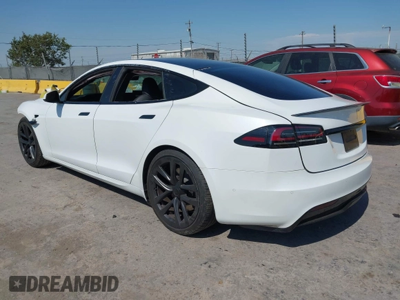 2023 Tesla Model S with VIN 5YJSA1E59PF500816, listed as a IAAI auction lot 42409049 with Not provided miles and . Bid and sale history available at DreamBid. Image 3.