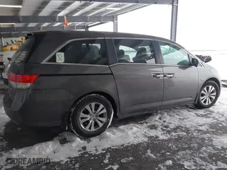 2016 Honda Odyssey SE with VIN 5FNRL5H32GB155946, listed as a IAAI auction lot 41590237 with 140,167 mi miles. Bid and sale history available at carsss.com. Image 14.