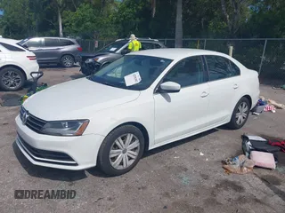 2017 Volkswagen Jetta S with VIN 3VW2B7AJXHM374687, listed as a IAAI auction lot 42596302 with 63,728 mi miles and . Bid and sale history available at DreamBid. Image 17.