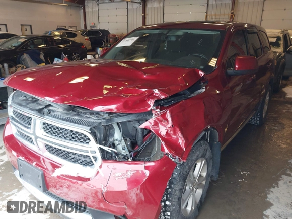 2013 Dodge Durango SXT with VIN 1C4RDJAG4DC527945, listed as a IAAI auction lot 41590545 with 141,074 mi miles and . Bid and sale history available at DreamBid. Image 19.