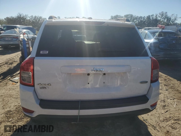 2012 Jeep Compass Latitude with VIN 1C4NJDEB4CD537763, listed as a Copart auction lot 84878244 with 198,582 mi miles and Clean Title. Bid and sale history available at DreamBid. Image 6.