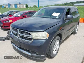 2013 Dodge Durango SXT z VIN 1C4RDHAG0DC592848, wystawiony jako IAAI lot #42177649 z przebiegiem Nie podano mil oraz . Historia ofert i sprzedaży dostępna na DreamBid. Obrazek 19.