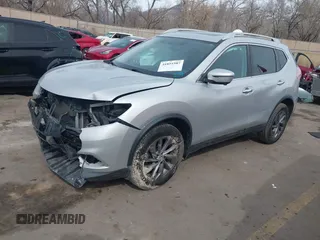 2016 Nissan Rogue SL with VIN 5N1AT2MV3GC762496, listed as a IAAI auction lot 41851987 with 90,623 mi miles and . Bid and sale history available at DreamBid. Image 2.